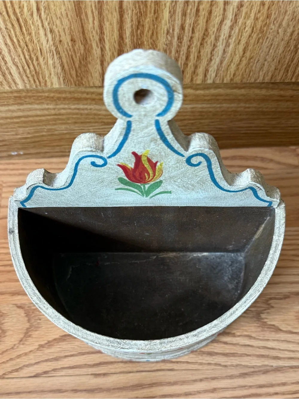 A wooden wall box for farmhouse decor,featuring hand-painted floral designs
